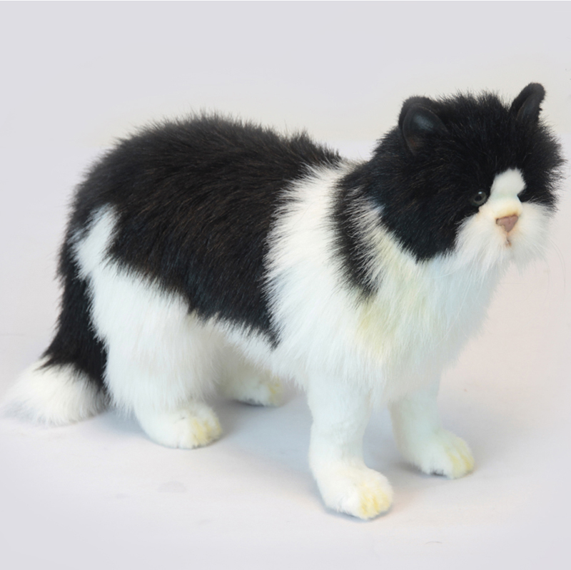 black and white cat cuddly toy